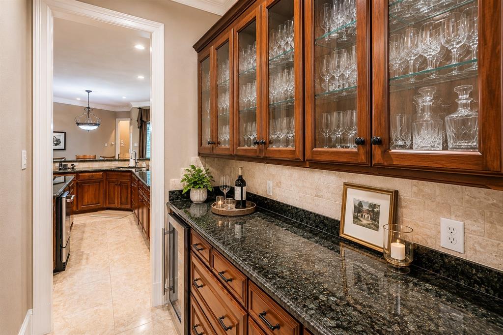 2726 Country Club Road Pantego, TX 76013 - Photo 6 of 23 a kitchen with a sink and a stove top oven
