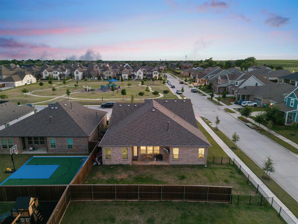 8808 Royal Star Road Rowlett, TX 75089 - Photo 39 of 40 a view of a big yard next to a large building