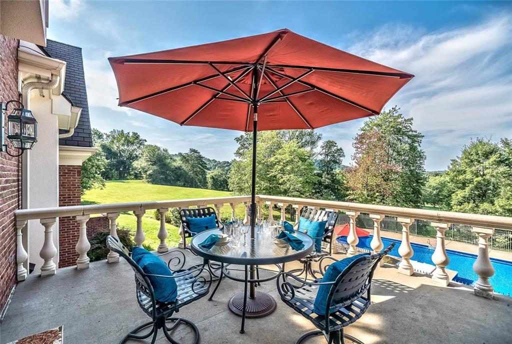 121 Buckthorn Drive Baden, PA 15005 - Photo 12 of 25 Huge raised patio with fabulous view of wooded grounds - access from kitchen, family room and den. Perfect for indoor/outdoor entertaining.
