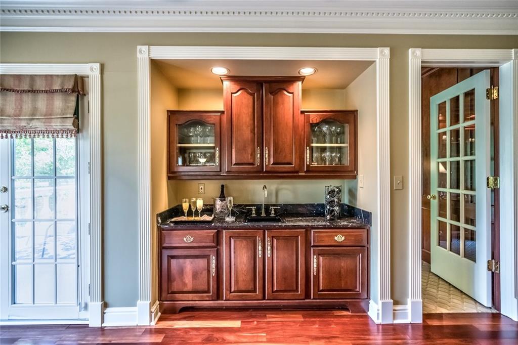 121 Buckthorn Drive Baden, PA 15005 - Photo 14 of 25 Family room wet bar has marble top, also conveniently located next to the den.