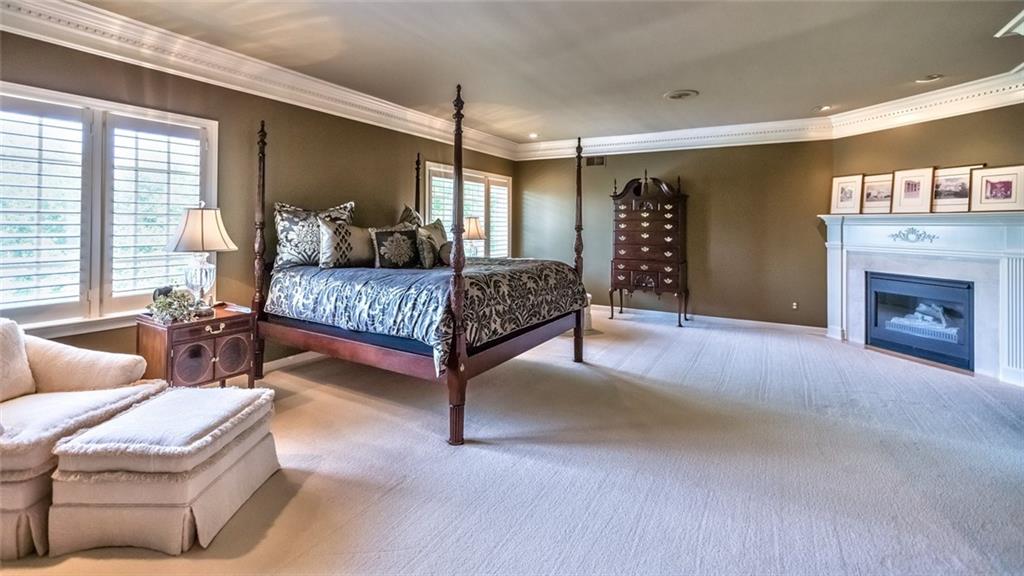 121 Buckthorn Drive Baden, PA 15005 - Photo 16 of 25 Plush master suite with fireplace, 2 ceiling stereo speakers, spa bath with walk in closet