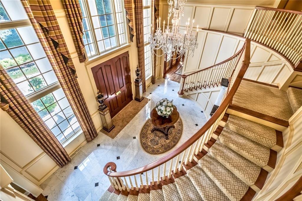 121 Buckthorn Drive Baden, PA 15005 - Photo 7 of 25 Impressive grand foyer - Francis J Nowalk crystal chandelier (on hoist), marble floors, gorgeous wedding staircase and beautiful wood work.
