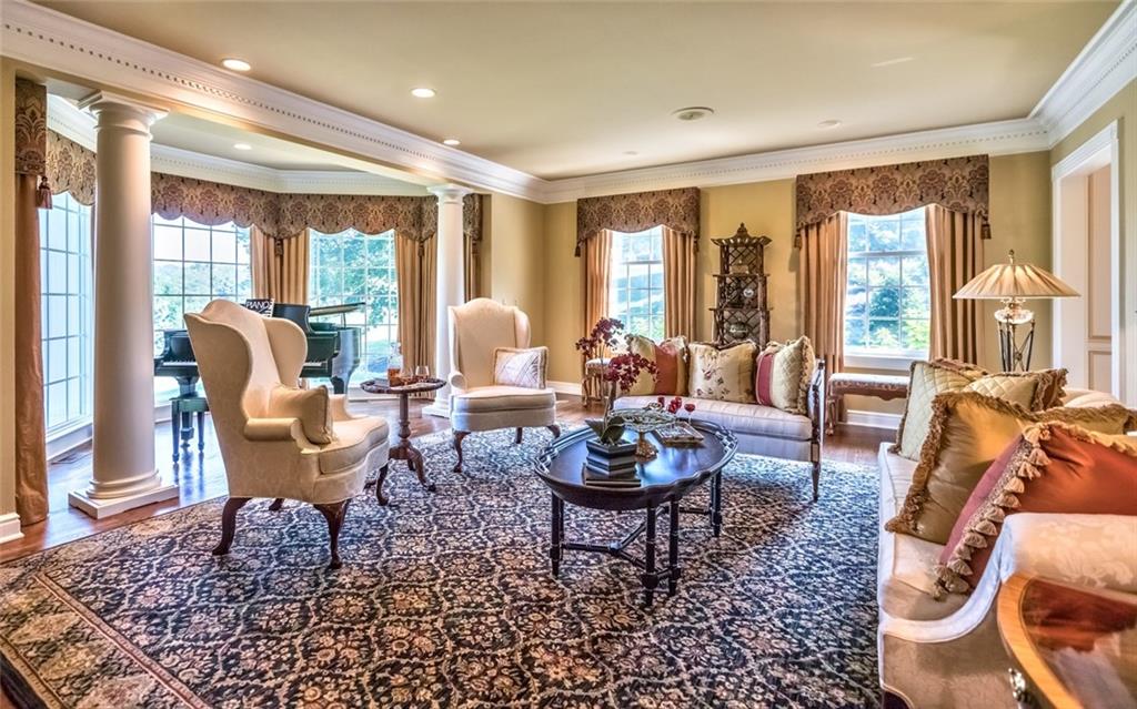 121 Buckthorn Drive Baden, PA 15005 - Photo 8 of 25 Elegant living room was built with piano in mind. Bay area could be used as separate sitting area or display area for your personal piece of art or antique for example.