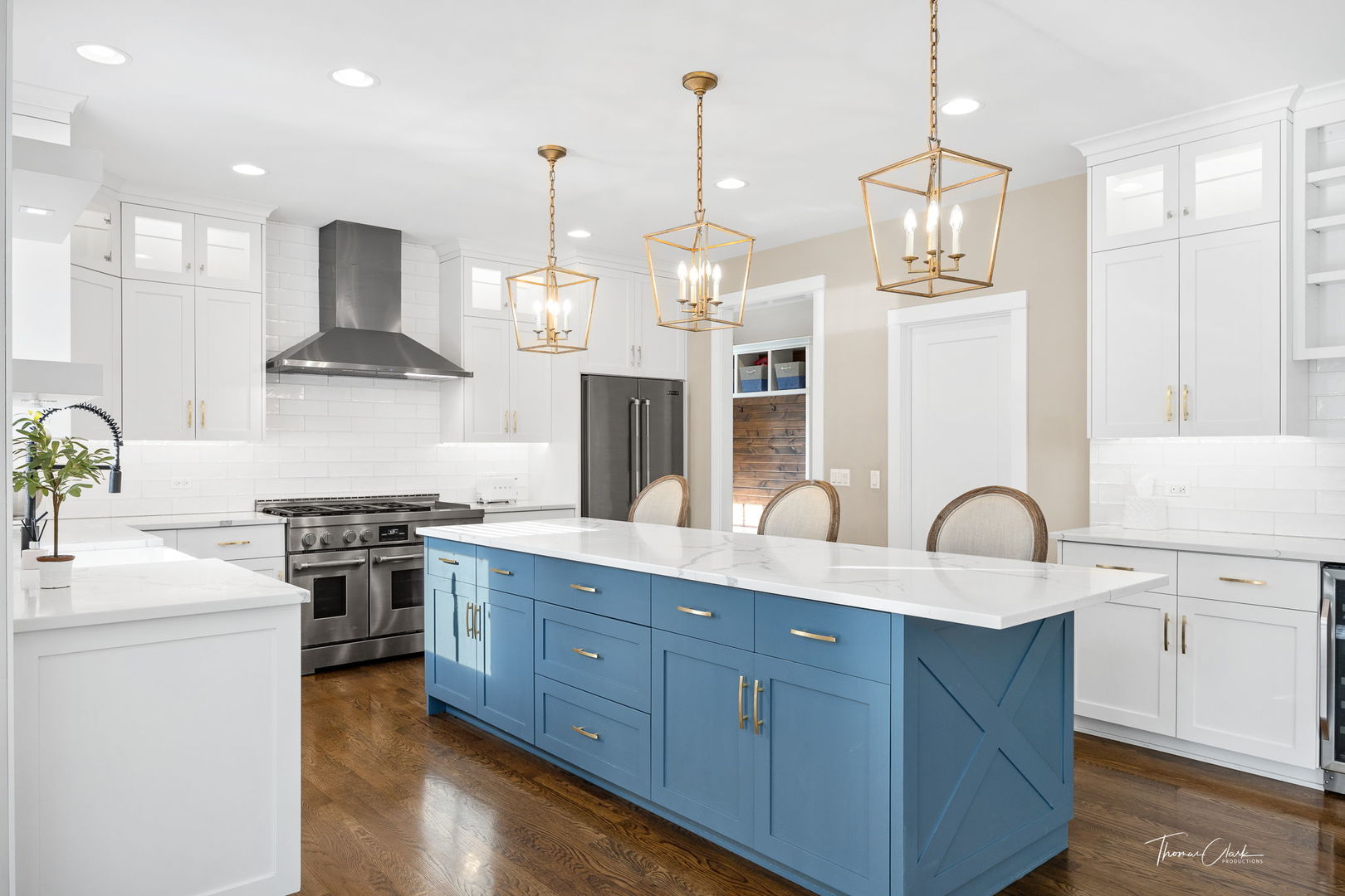 4720 Cumnor Road Downers Grove, IL 60515 - Photo 13 of 57 a kitchen with stainless steel appliances granite countertop a stove a sink and a wooden floor