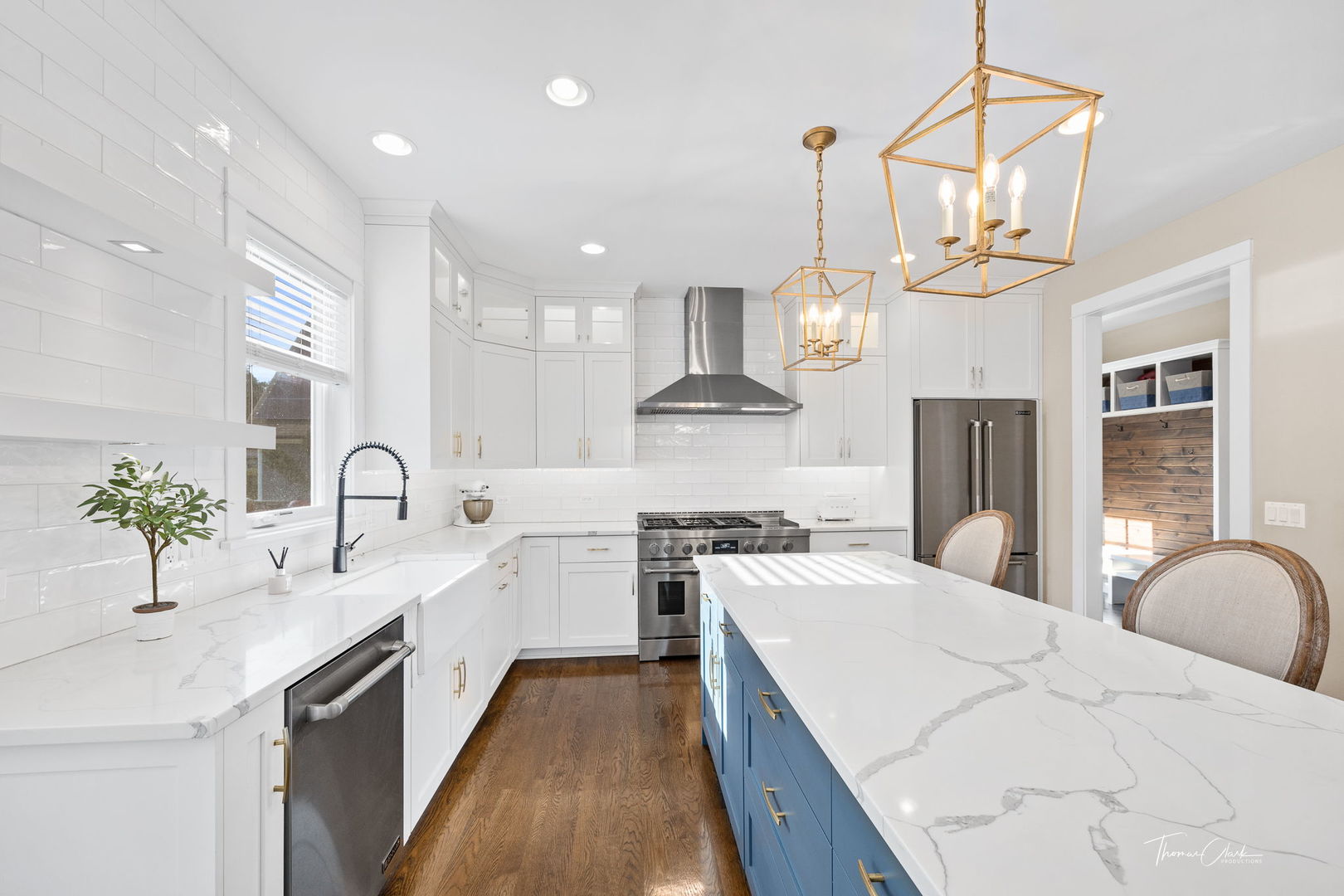 4720 Cumnor Road Downers Grove, IL 60515 - Photo 15 of 57 a kitchen with kitchen island granite countertop a sink a counter space appliances and cabinets