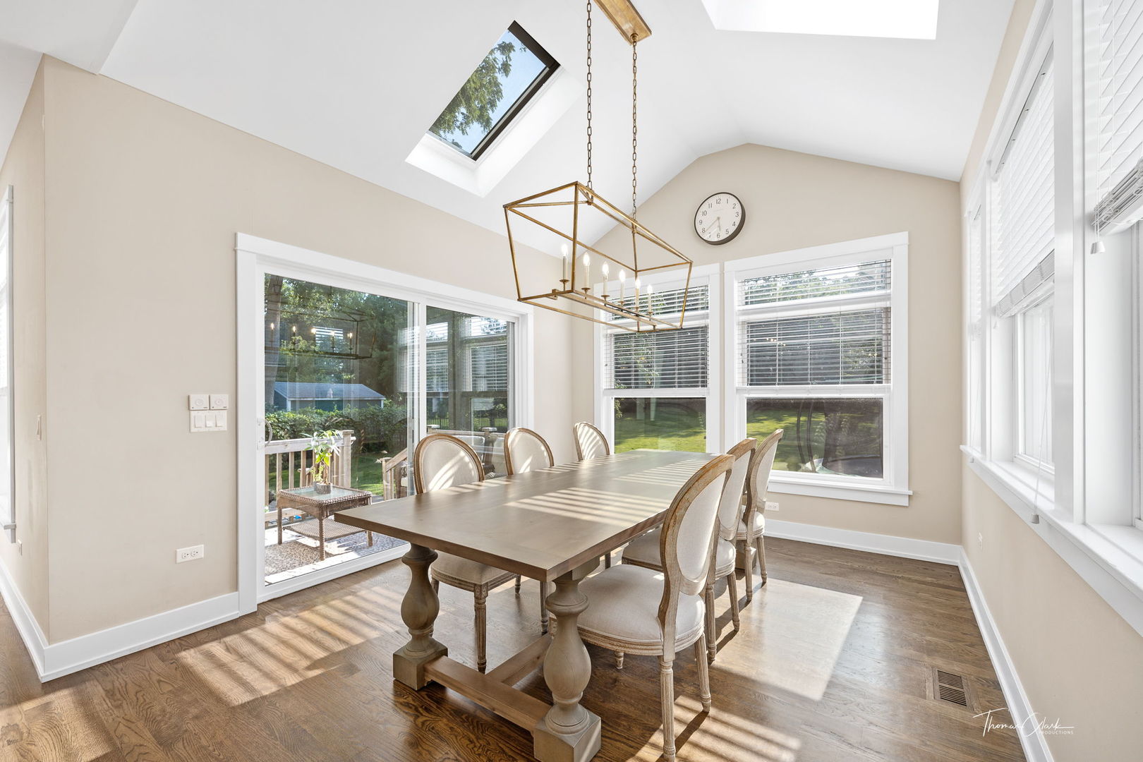 4720 Cumnor Road Downers Grove, IL 60515 - Photo 16 of 57 a view of a dining room with furniture wooden floor and a window