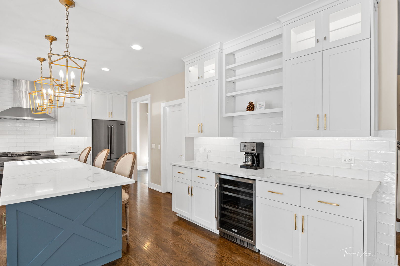 4720 Cumnor Road Downers Grove, IL 60515 - Photo 19 of 57 a kitchen with white cabinets and stainless steel appliances