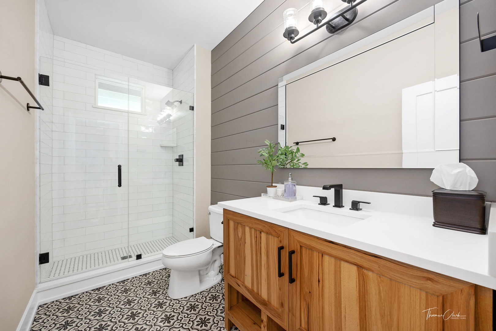 4720 Cumnor Road Downers Grove, IL 60515 - Photo 22 of 57 a bathroom with a sink a toilet and shower