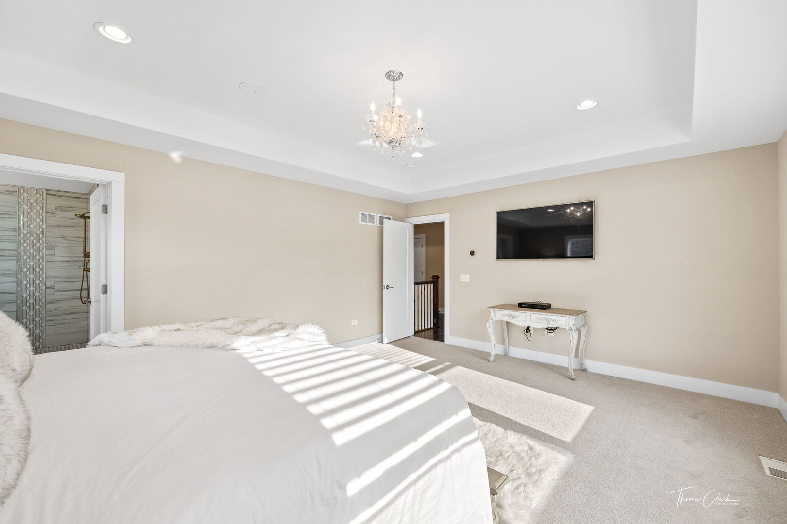 4720 Cumnor Road Downers Grove, IL 60515 - Photo 26 of 57 a bedroom with a bed and a flat screen tv