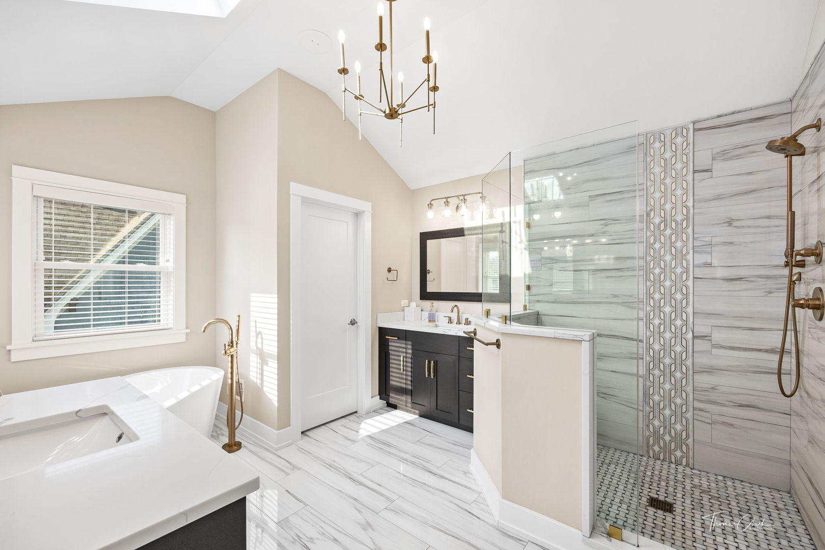 4720 Cumnor Road Downers Grove, IL 60515 - Photo 27 of 57 a spacious bathroom with a granite countertop sink a mirror a bathtub and shower