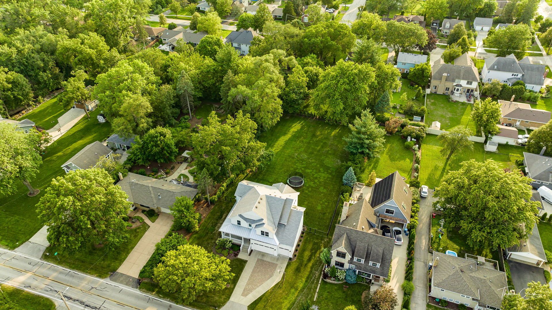 4720 Cumnor Road Downers Grove, IL 60515 - Photo 3 of 57 an aerial view of residential houses with outdoor space