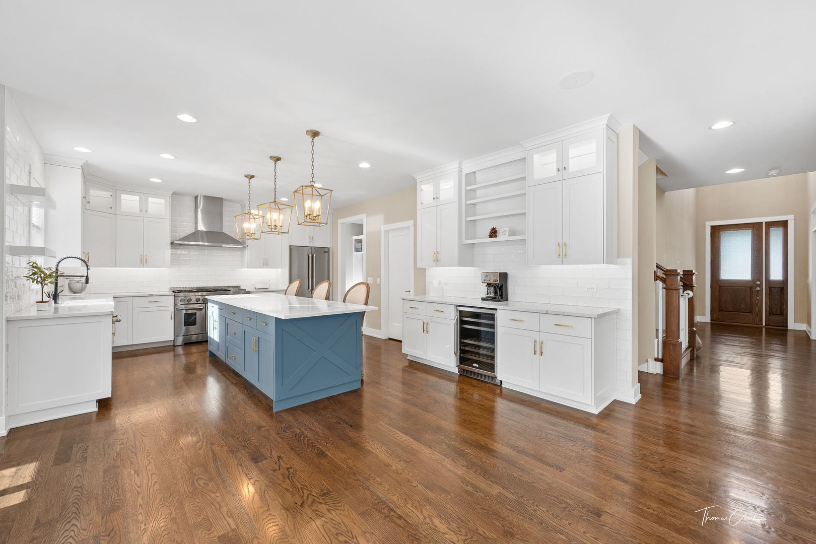 4720 Cumnor Road Downers Grove, IL 60515 - Photo 8 of 57 a large kitchen with a lot of counter space and wooden floor