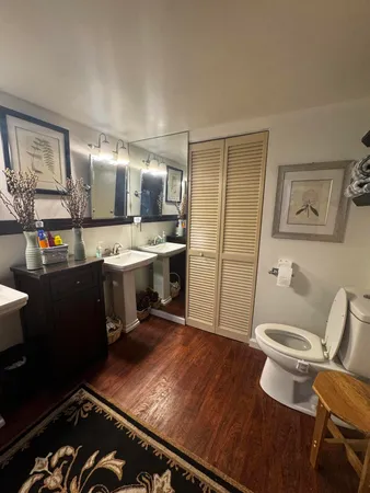 a room with stainless steel appliances furniture and a window