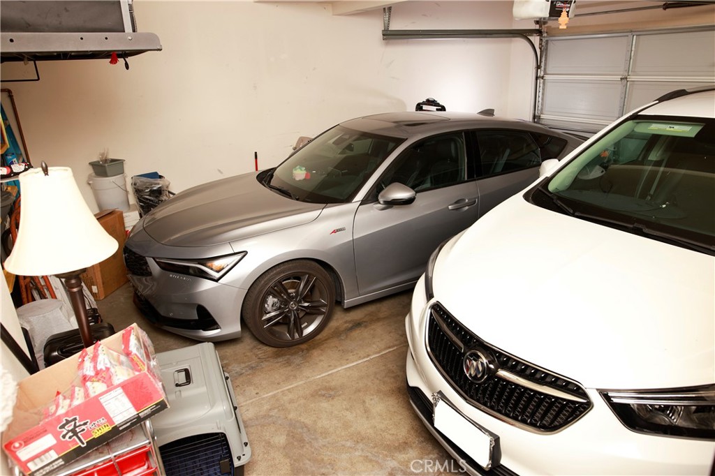 8090 Cornwall Court, Unit 51 Rancho Cucamonga, CA 91739 - Photo 24 of 36 two car attached garage