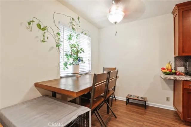 a workspace with furniture and wooden floor