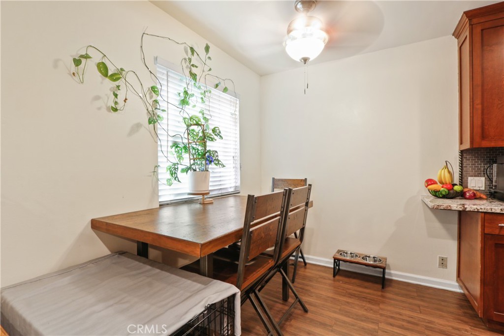 939 East Appleton Street, Unit 25 Long Beach, CA 90802 - Photo 3 of 10 a workspace with furniture and wooden floor