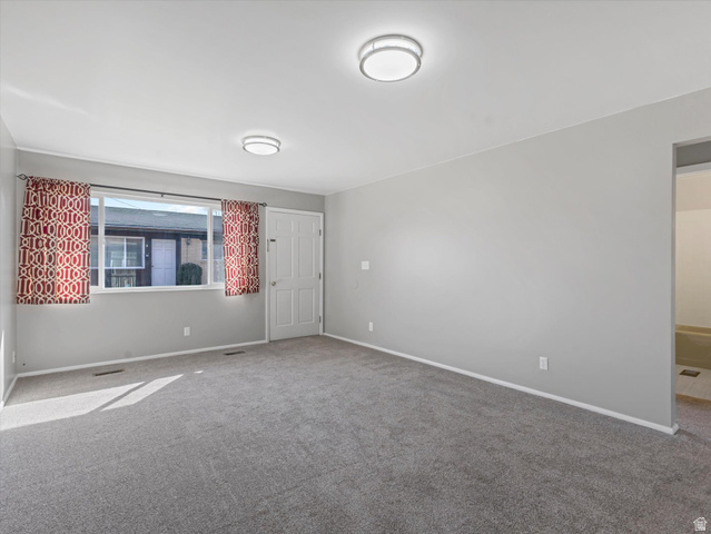 1478 North 75 West, Unit AD Sunset, UT 84015 - Photo 20 of 26 Spare room with baseboards and carpet flooring
