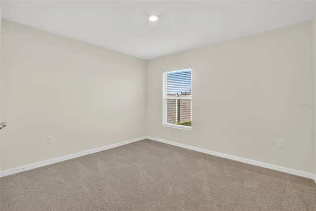 a view of a lake from a yard