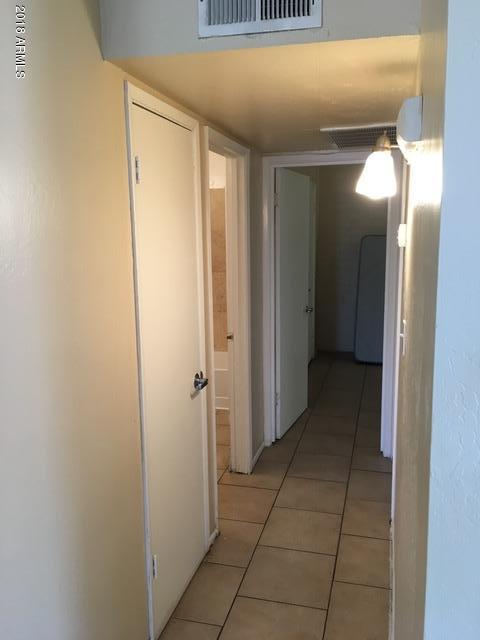 7106 North 68th Avenue, Unit 1 Glendale, AZ 85303 - Photo 15 of 22 a view of a hallway with a elevator