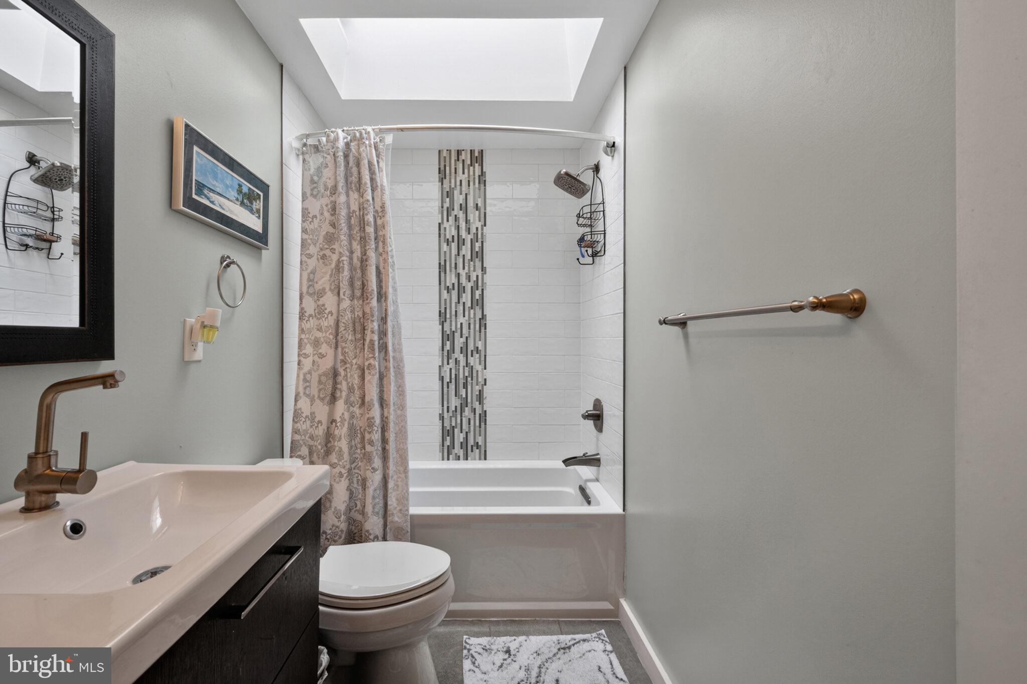5939 Craft Alexandria, VA 22310 - Photo 15 of 54 a bathroom with a sink toilet and shower