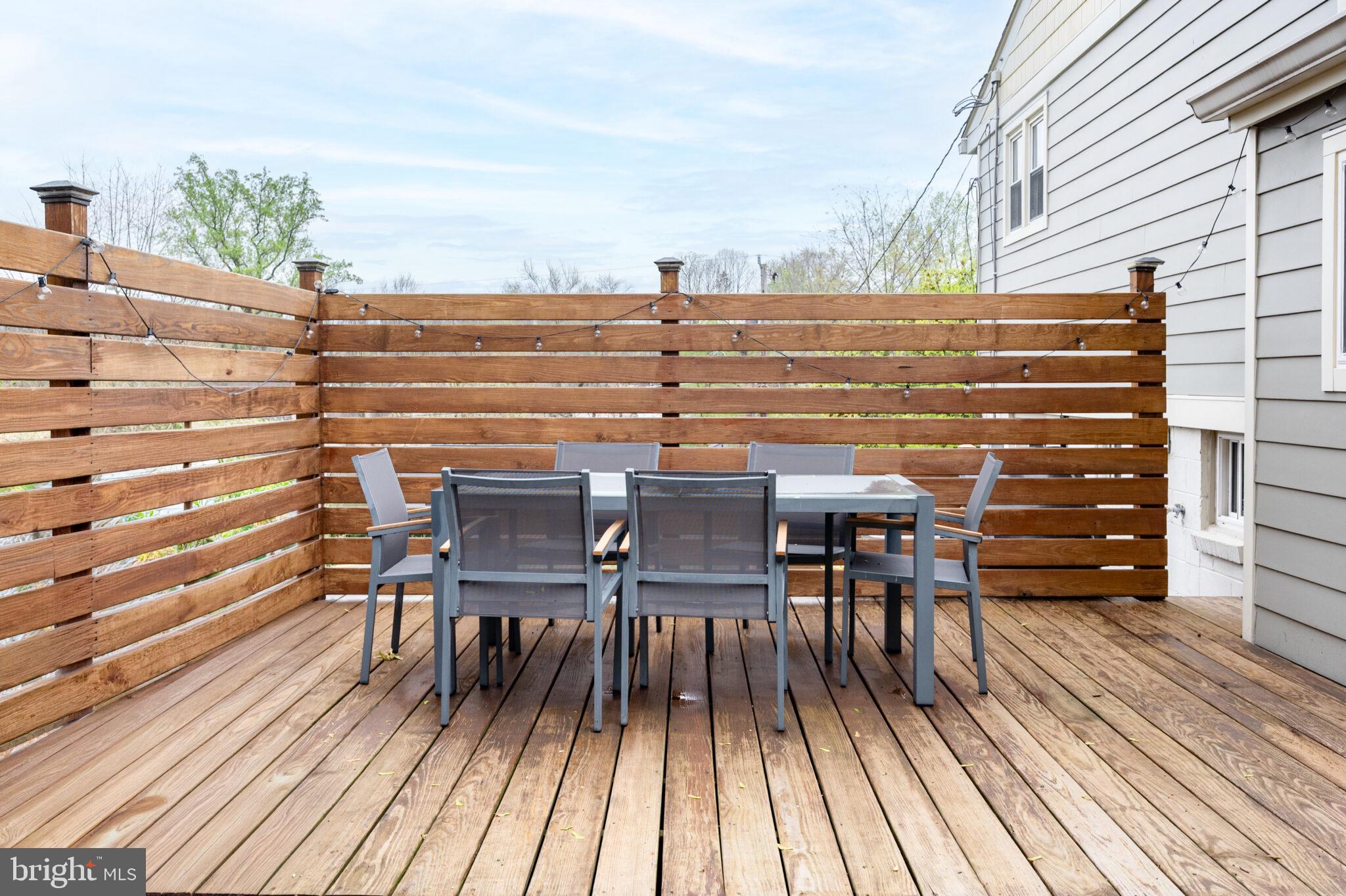 5939 Craft Alexandria, VA 22310 - Photo 33 of 54 a view of a chairs and table on the wooden deck