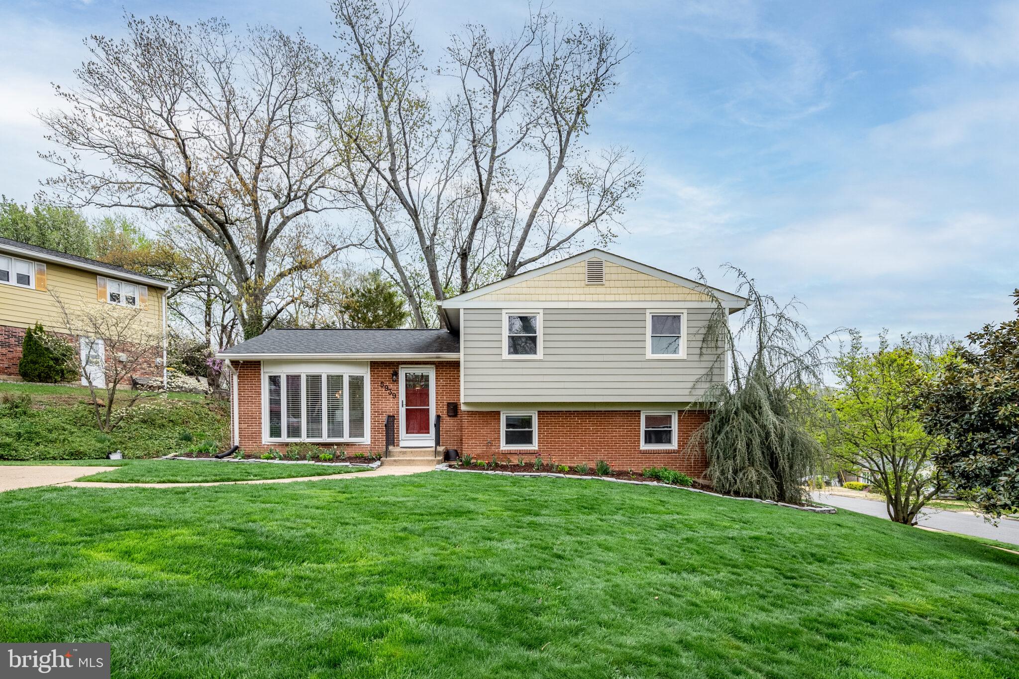5939 Craft Alexandria, VA 22310 - Photo 42 of 54 a front view of a house with yard and green space
