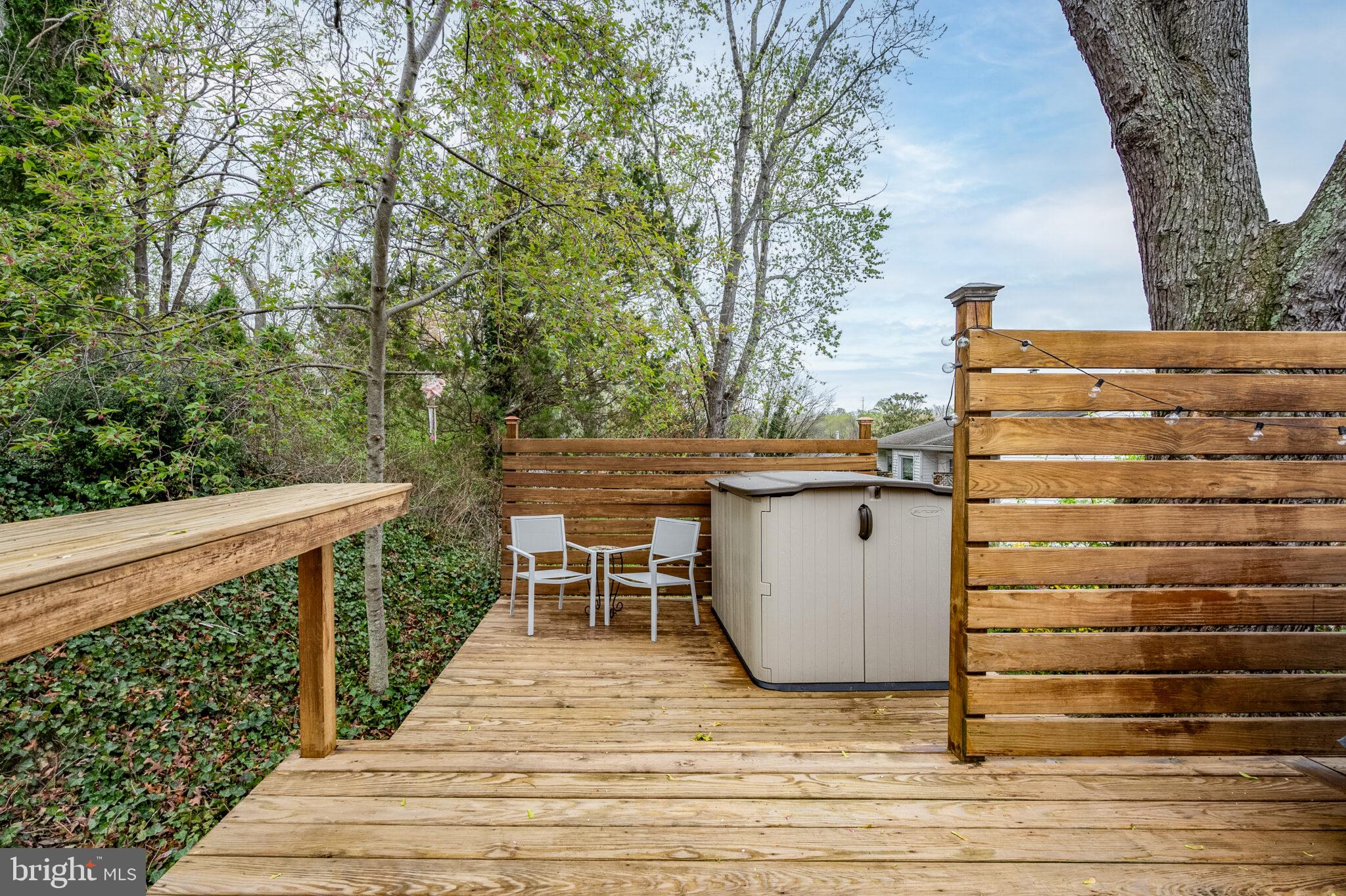 5939 Craft Alexandria, VA 22310 - Photo 43 of 54 a backyard of a house with wooden floor and outdoor seating