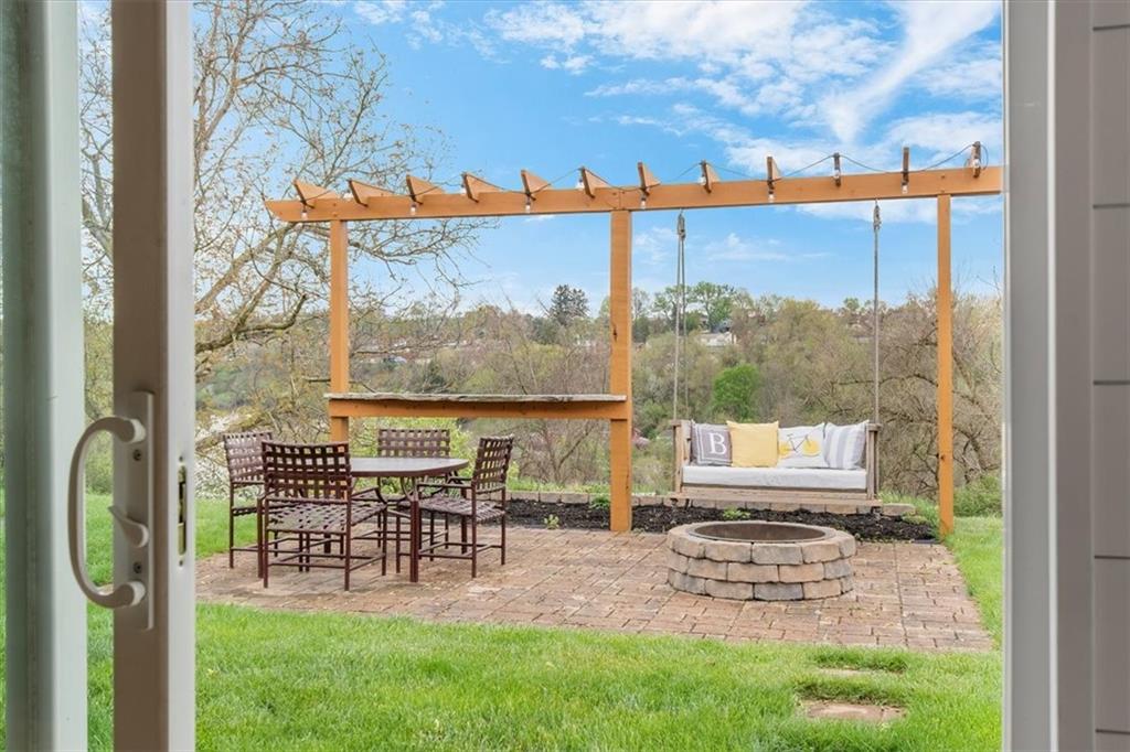 666 Lindsay Road Carnegie, PA 15106 - Photo 20 of 25 a view of a chairs and table in backyard of the house