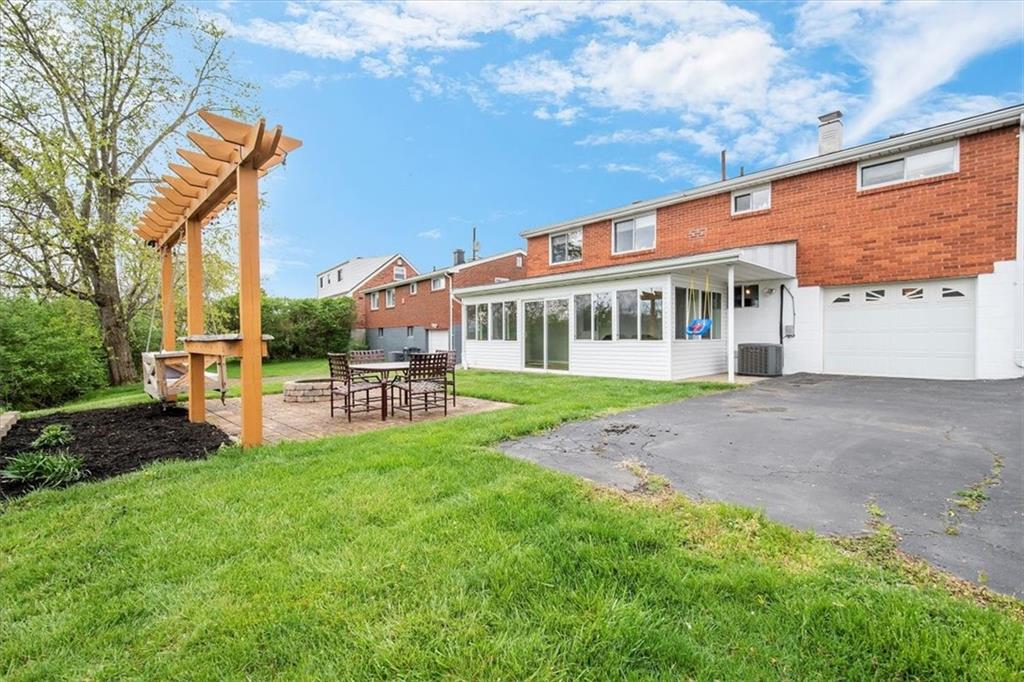 666 Lindsay Road Carnegie, PA 15106 - Photo 21 of 25 a house view with a sitting space and garden