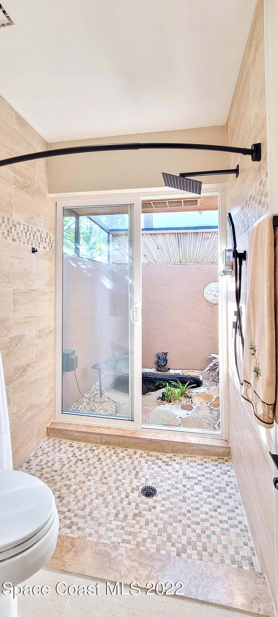 845 Raintree Avenue Rockledge, FL 32955 - Photo 17 of 78 Shower to atrium