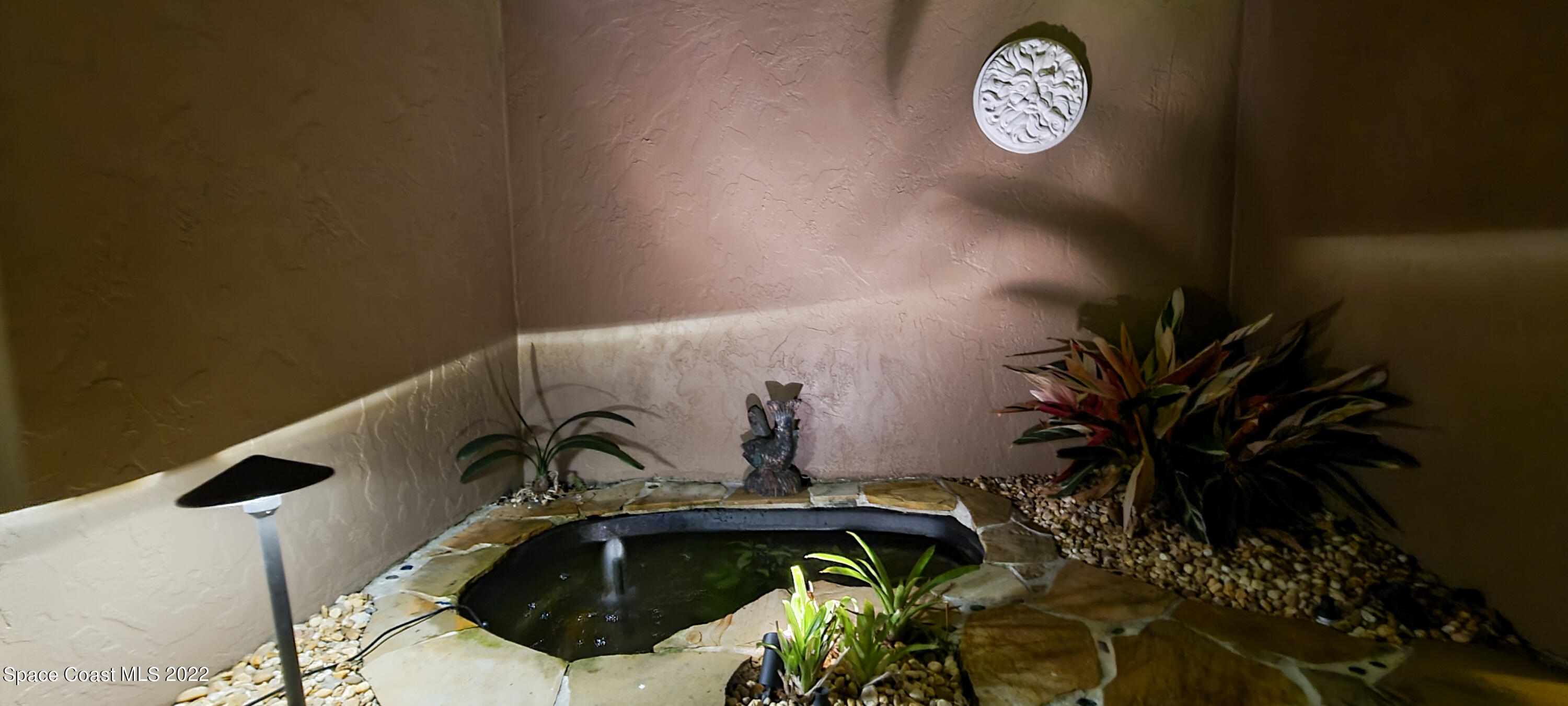 845 Raintree Avenue Rockledge, FL 32955 - Photo 46 of 78 Artium w/ private pond 2