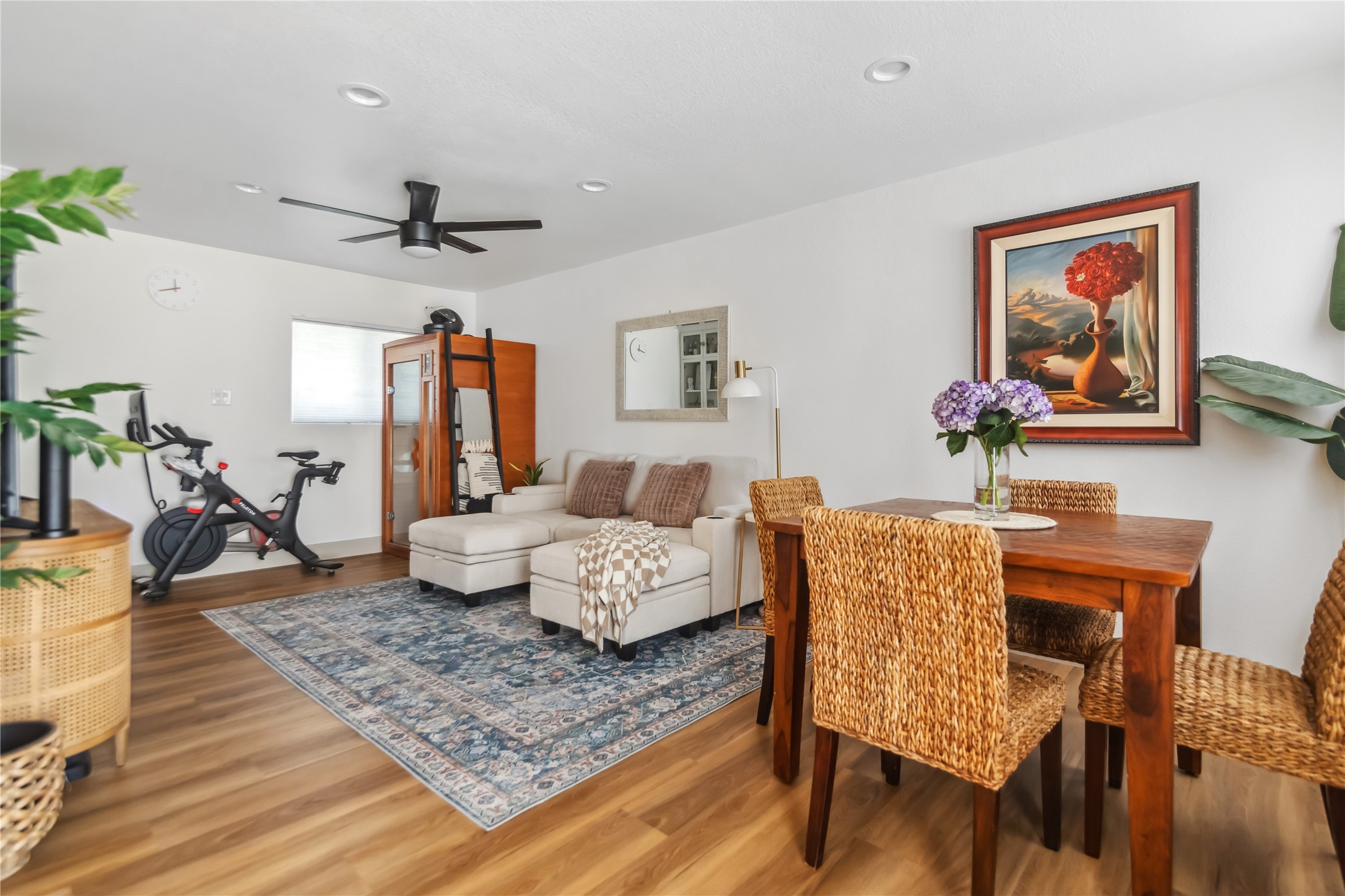 1313 East 52nd Street, Unit 101 Austin, TX 78723 - Photo 11 of 14 a living room with furniture and wooden floor