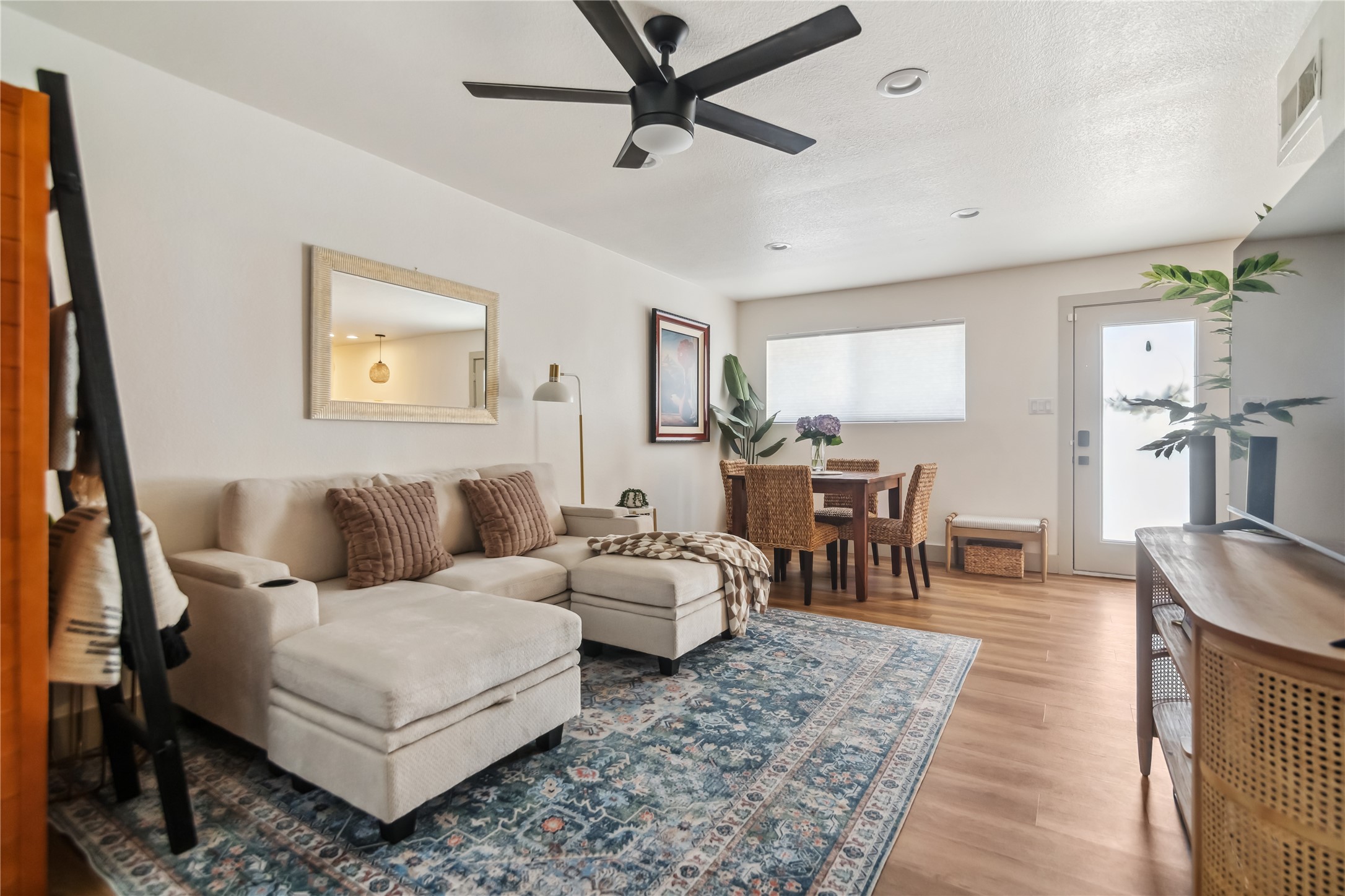 1313 East 52nd Street, Unit 101 Austin, TX 78723 - Photo 10 of 14 a living room with furniture