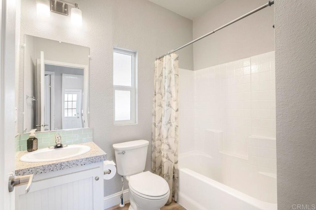 3505 Alpine Boulevard, Unit 15 Alpine, CA 91901 - Photo 13 of 23 a bathroom with a sink a toilet and a bathtub