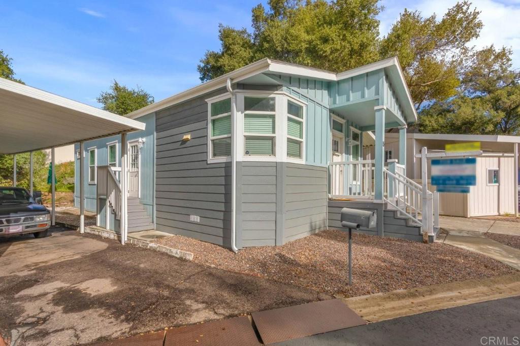 3505 Alpine Boulevard, Unit 15 Alpine, CA 91901 - Photo 2 of 23 a front view of a house with a garage