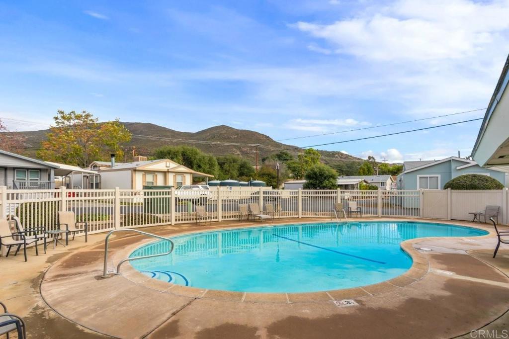 3505 Alpine Boulevard, Unit 15 Alpine, CA 91901 - Photo 23 of 23 a view of a swimming pool with a lake view