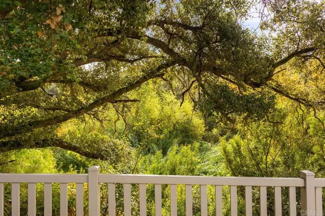 a view of a street with a building in the background
