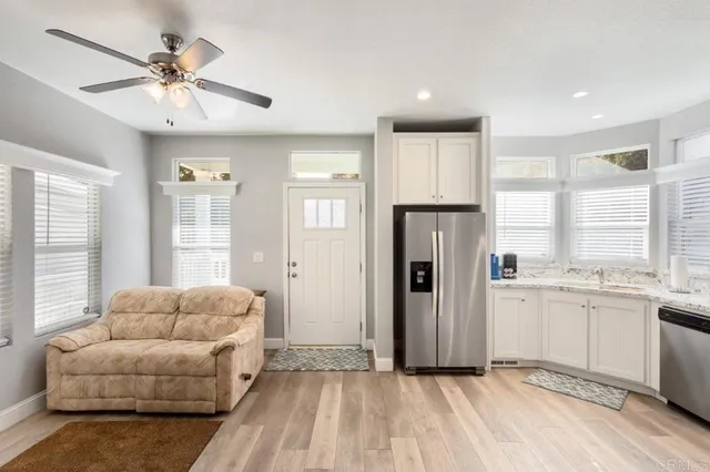 a living room with furniture and a window