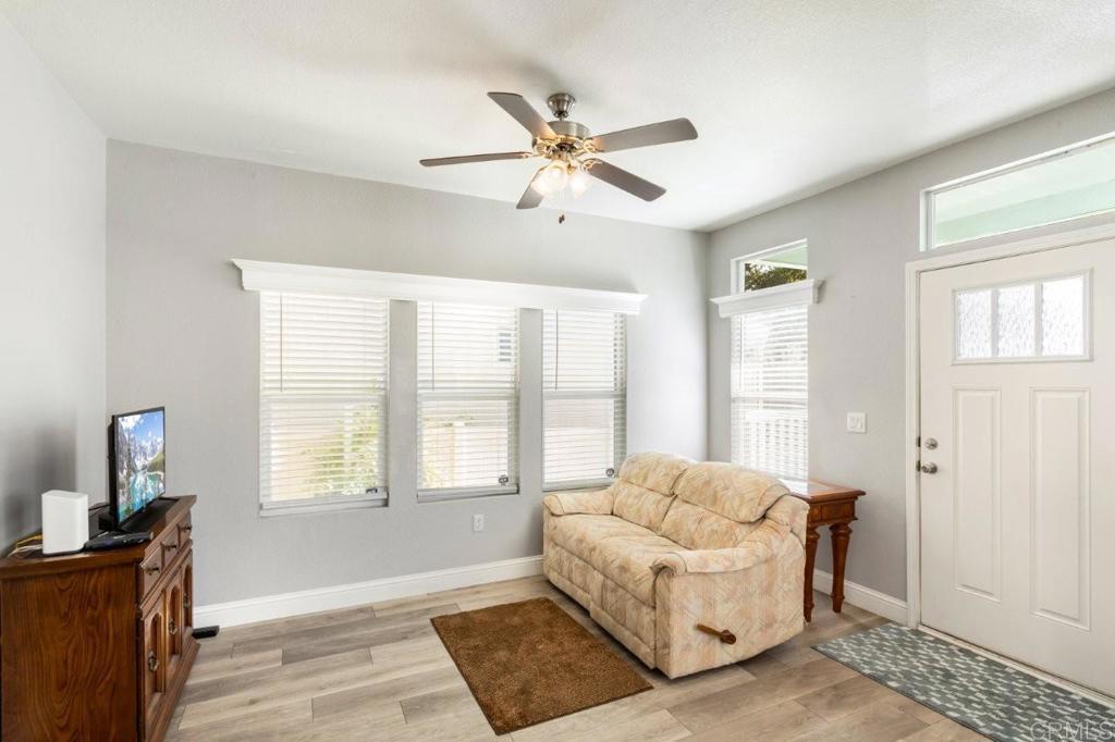 3505 Alpine Boulevard, Unit 15 Alpine, CA 91901 - Photo 8 of 23 a living room with furniture and a window