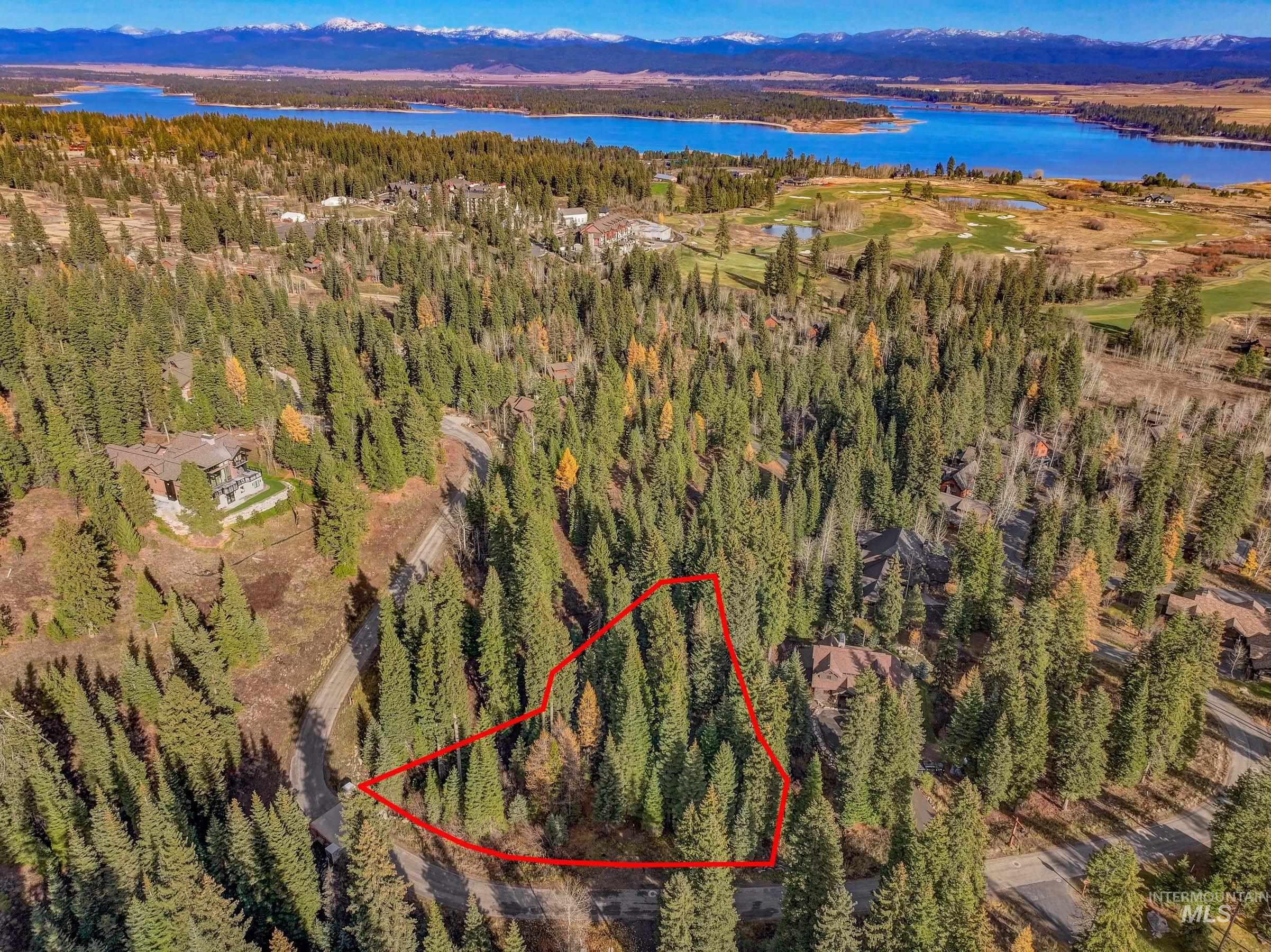 150 Pinnacle Court Cascade, ID 83611 - Photo 15 of 30 Aerial view of property and surrounding area featuring property boundaries highlighted and a mountain backdrop