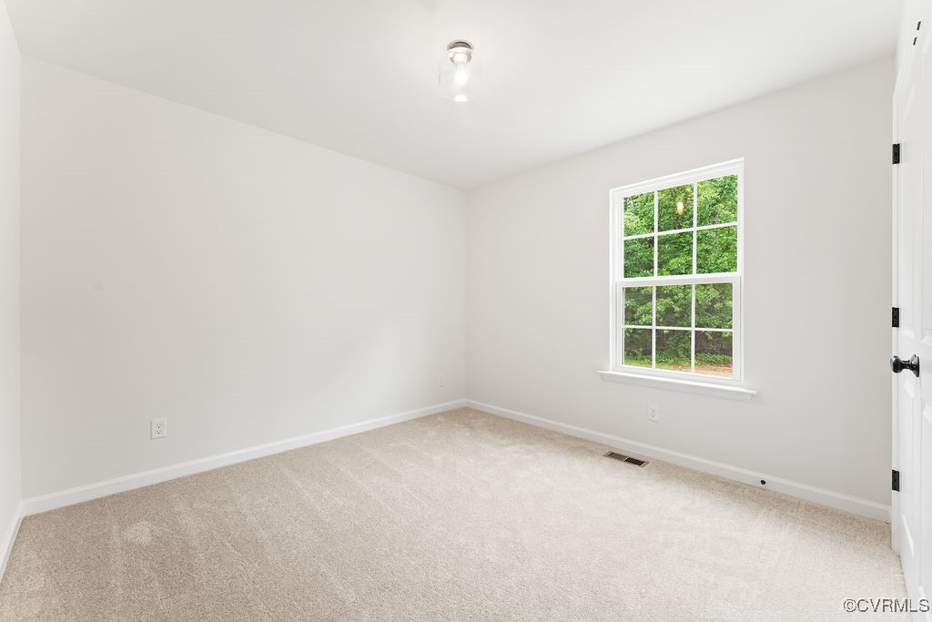 26354 Old Pitts Road Ruther Glen, VA 22546 - Photo 30 of 36 Spare room with carpet and baseboards
