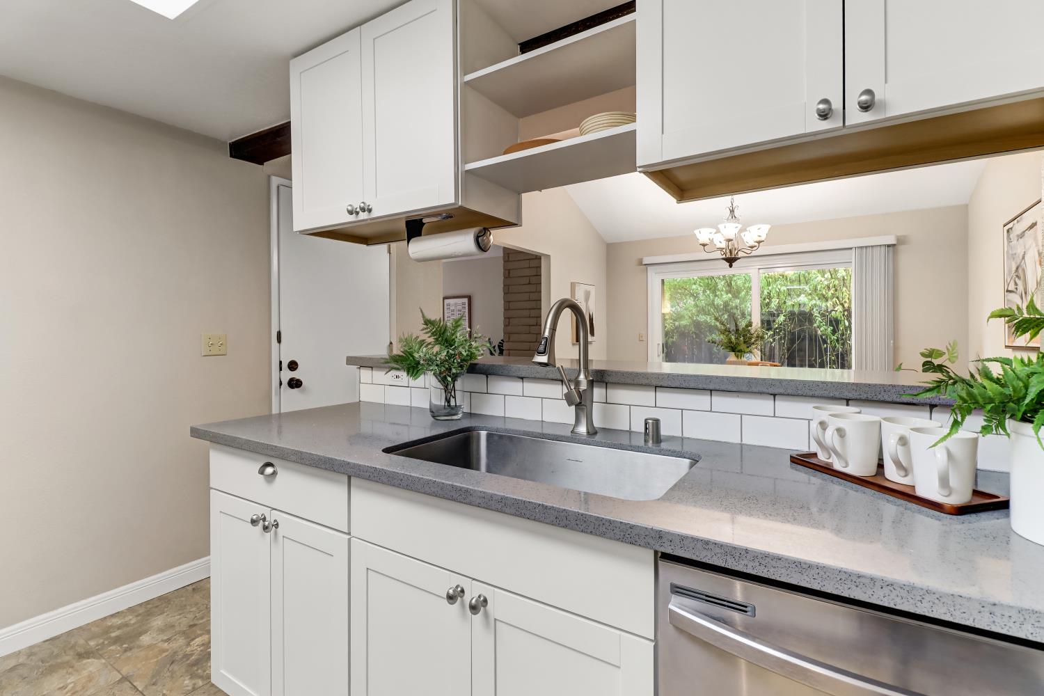 2317 East 8th Street Davis, CA 95618 - Photo 22 of 42 a kitchen with a sink and a window