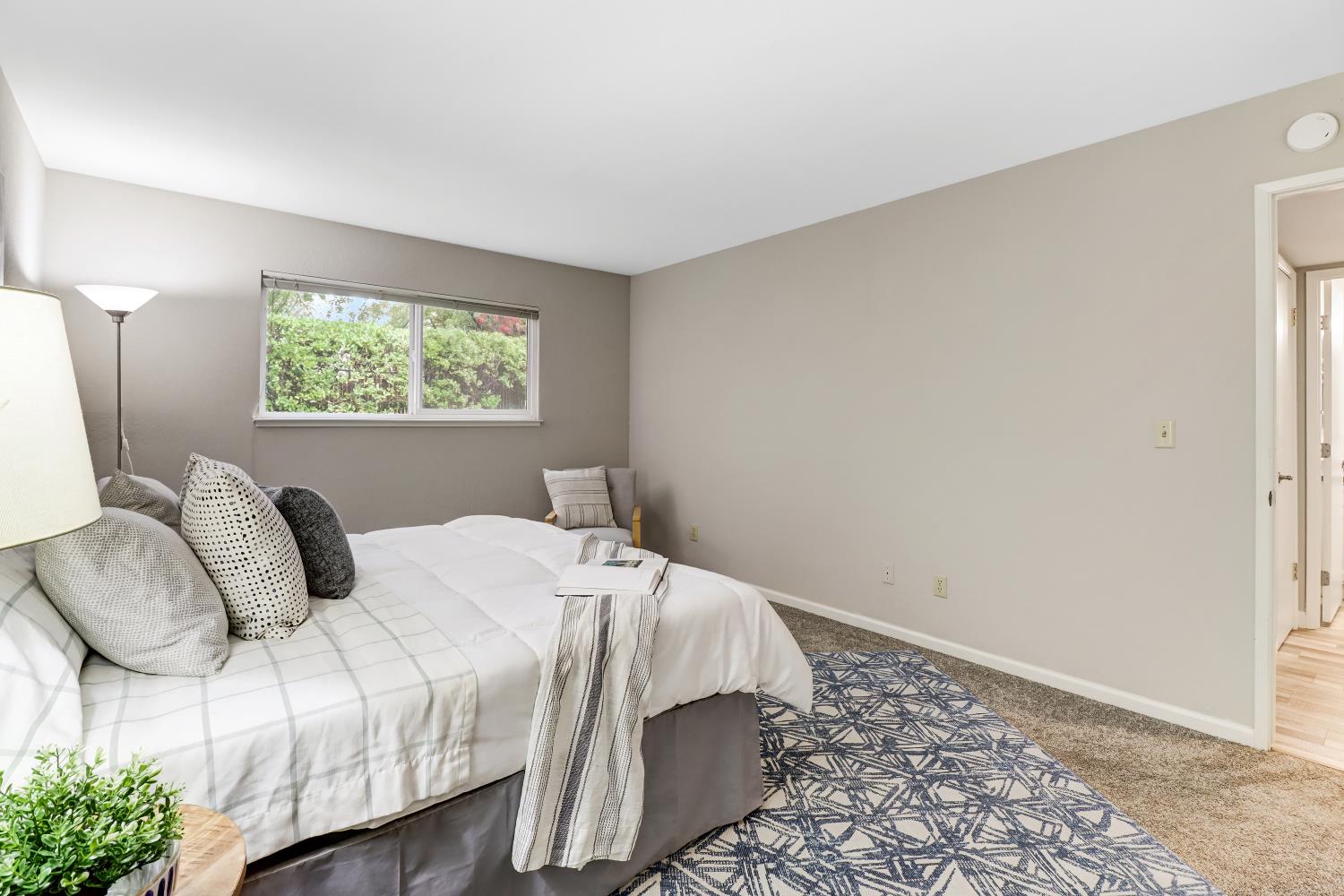 2317 East 8th Street Davis, CA 95618 - Photo 26 of 42 a bedroom with a bed and a window