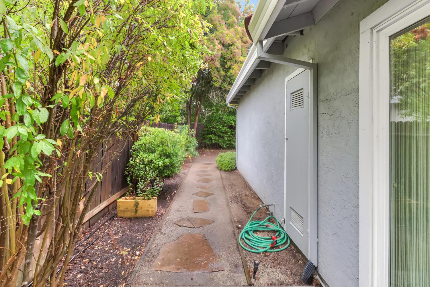 2317 East 8th Street Davis, CA 95618 - Photo 35 of 42 a view of a pathway with a flower garden