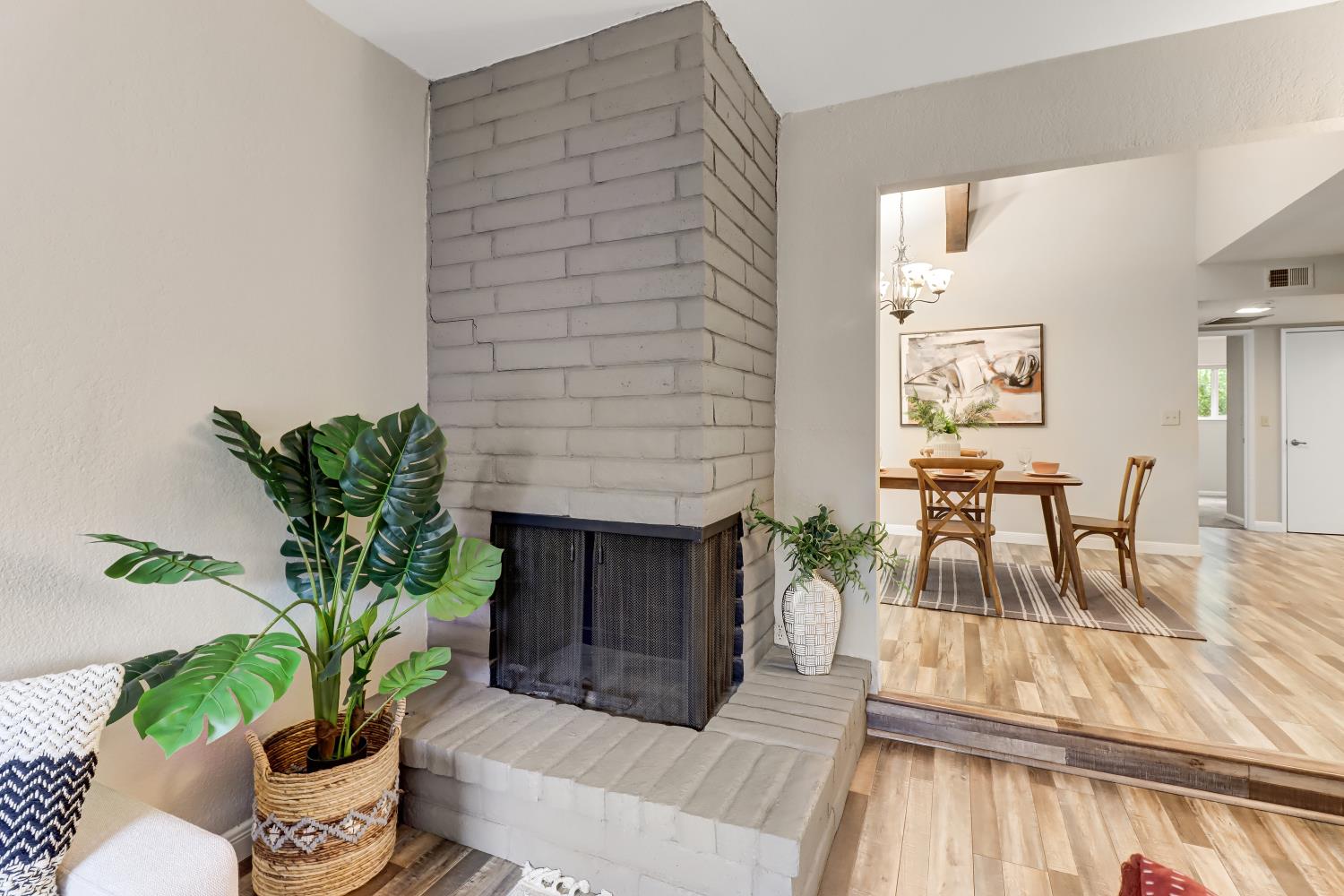 2317 East 8th Street Davis, CA 95618 - Photo 9 of 42 a living room with furniture and a potted plant