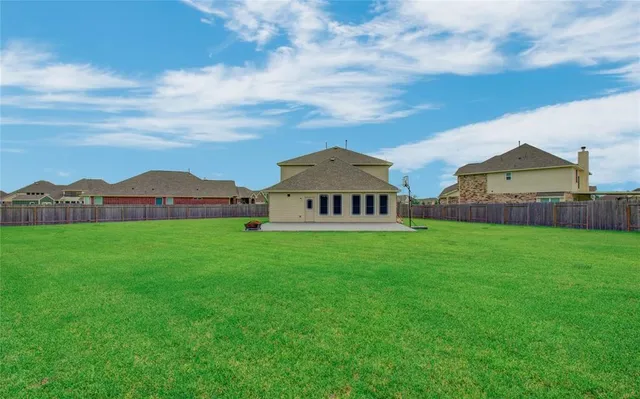 a view of a house with a big yard
