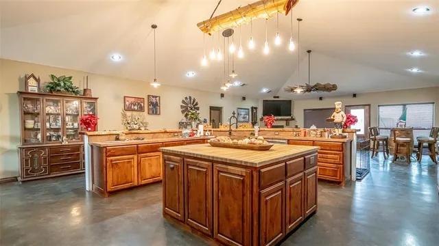 a bedroom with furniture and wooden floor