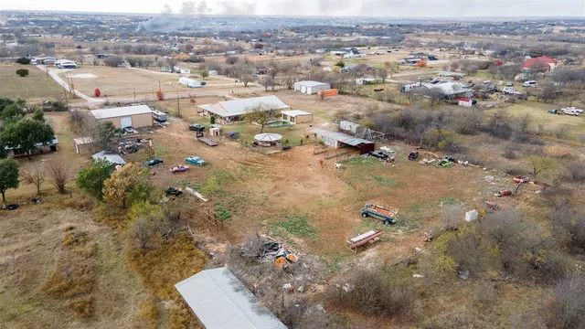 a room with lots of chairs and a flat screen tv