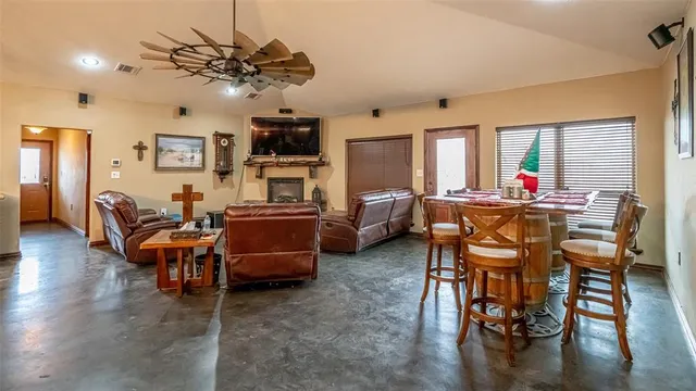 a kitchen that has a lot of cabinets in it
