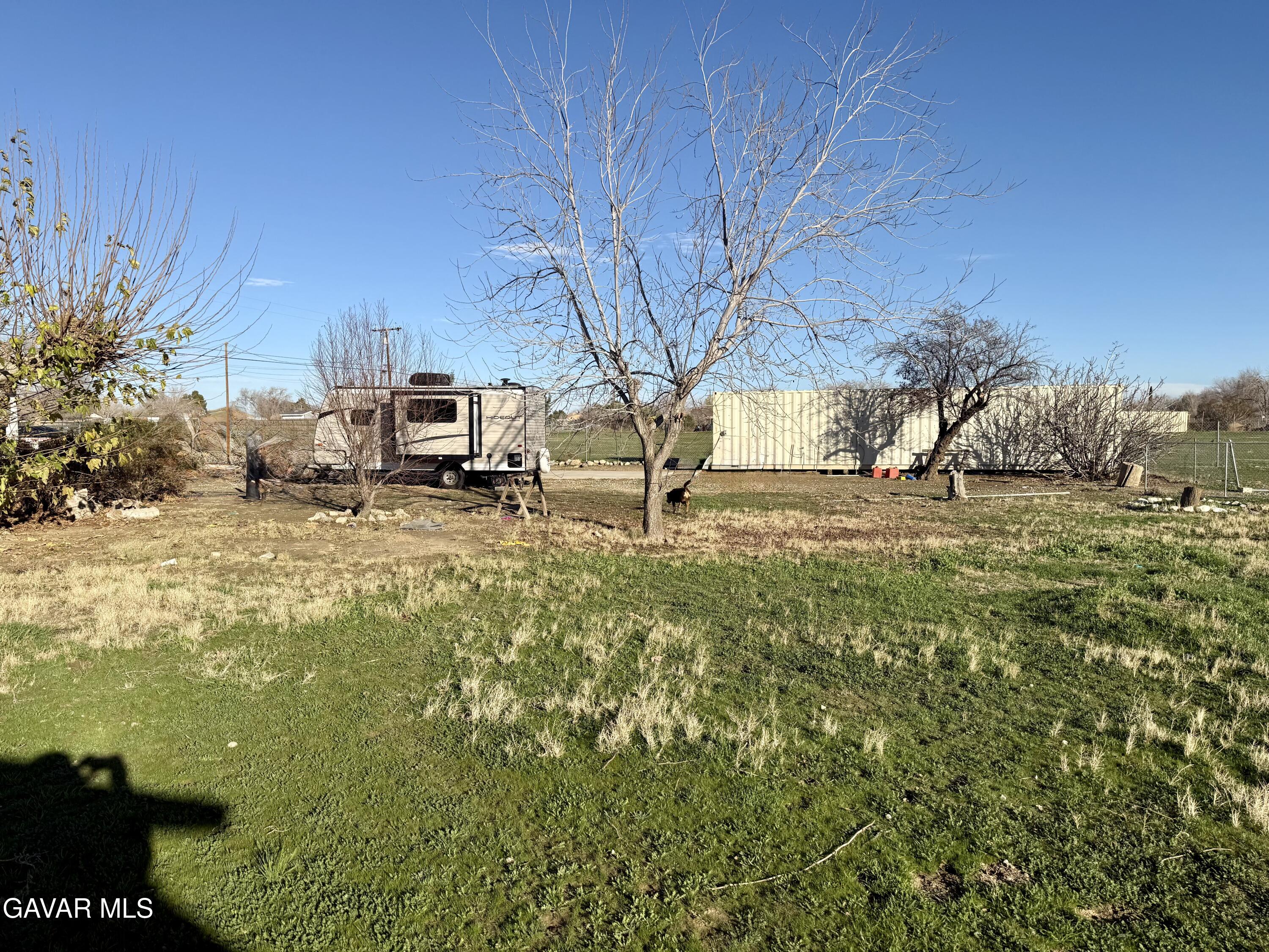 10256 East Ave R 12 Littlerock, CA 93543 - Photo 20 of 21 a view of yard with outdoor seating